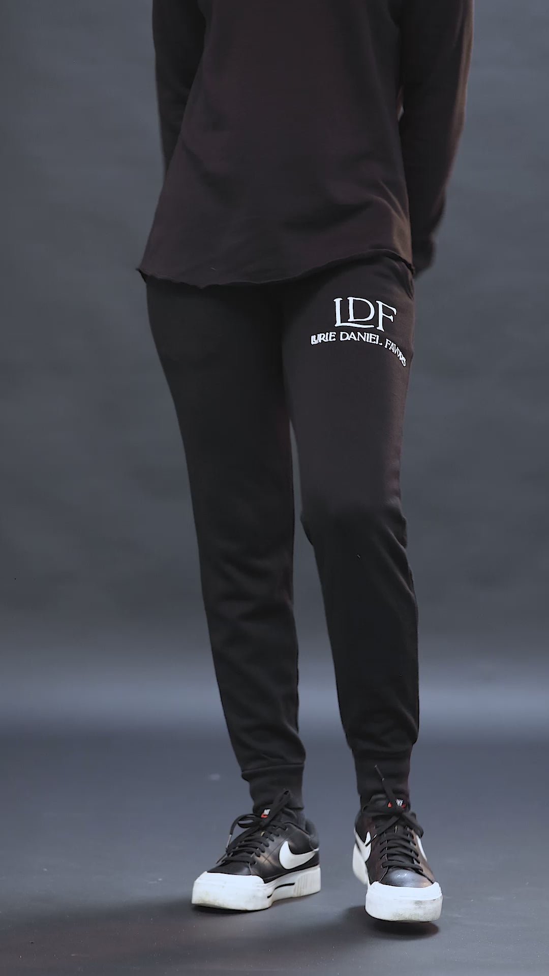 Load video: Women’s Black Pigment-Dyed Jogger – Pause. Breathe. Decide.